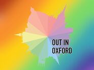 OULGBTQ+ Soc logo with 'Out in Oxford' written across it in black text and the whole logo is in front of a rainbow gradient background.